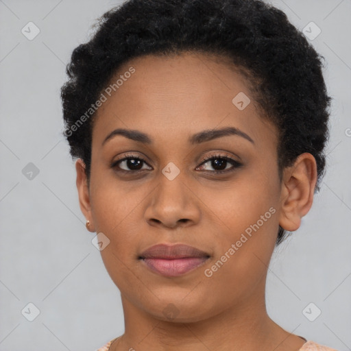 Joyful black young-adult female with short  black hair and brown eyes