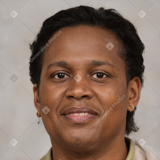 Joyful black young-adult male with short  brown hair and brown eyes