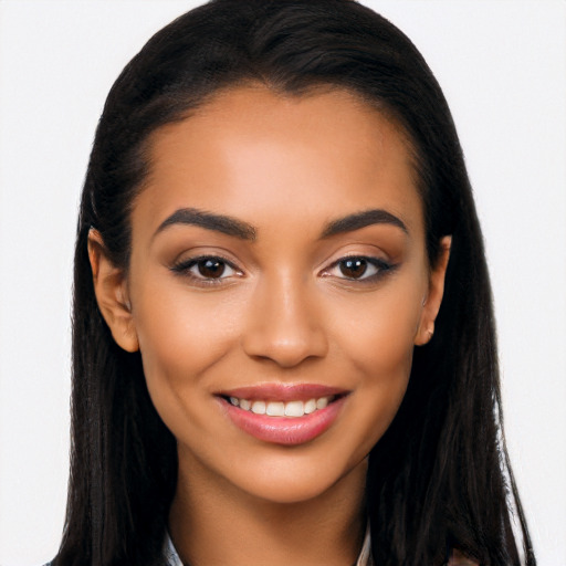 Joyful latino young-adult female with long  black hair and brown eyes