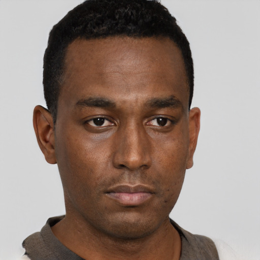 Neutral black young-adult male with short  black hair and brown eyes