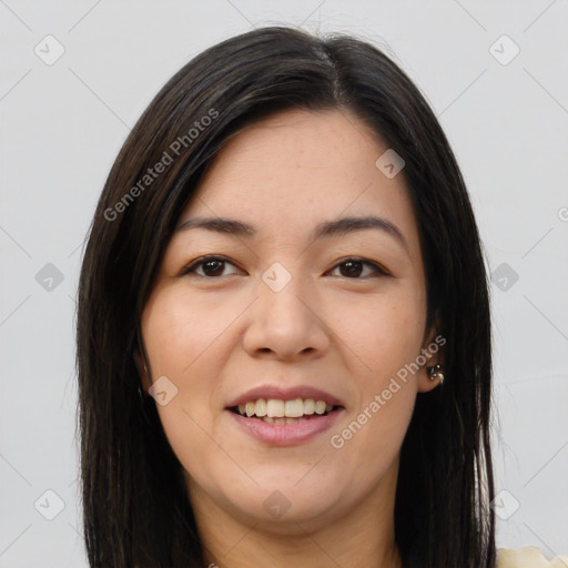 Joyful asian young-adult female with long  brown hair and brown eyes