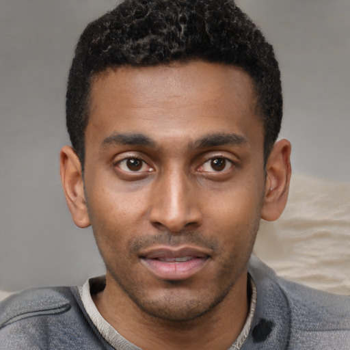 Neutral black young-adult male with short  black hair and brown eyes