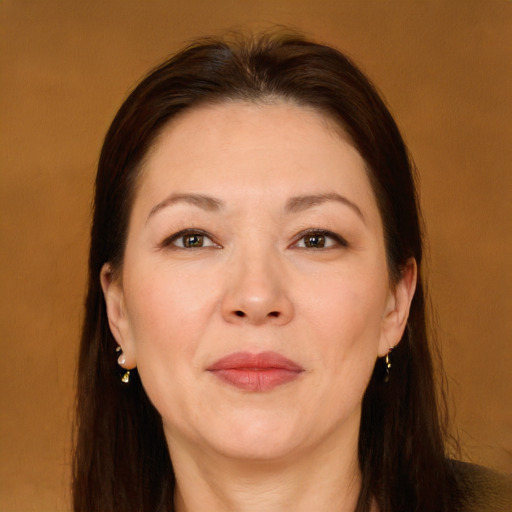 Joyful white adult female with long  brown hair and brown eyes