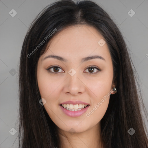 Joyful asian young-adult female with long  brown hair and brown eyes