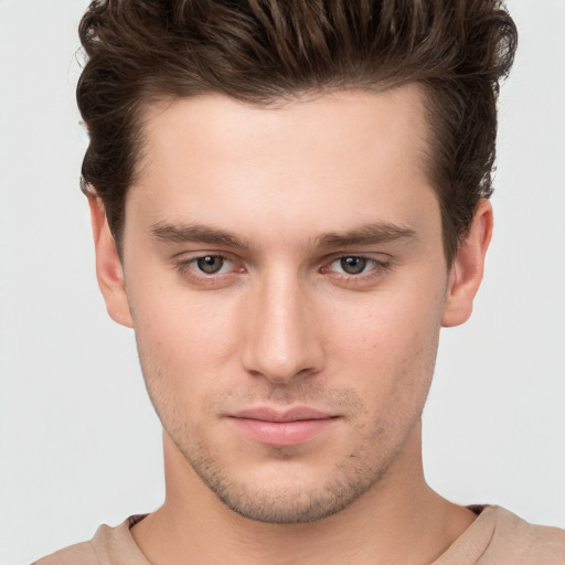 Neutral white young-adult male with short  brown hair and brown eyes