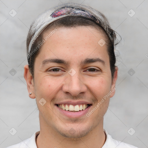 Joyful white adult male with short  brown hair and brown eyes