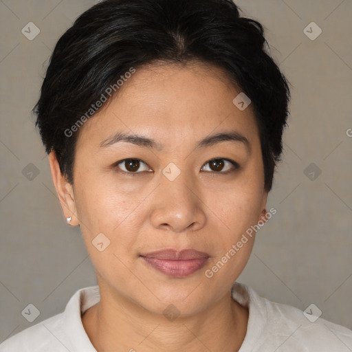 Joyful asian young-adult female with short  brown hair and brown eyes