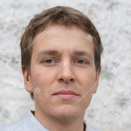 Neutral white young-adult male with short  brown hair and grey eyes