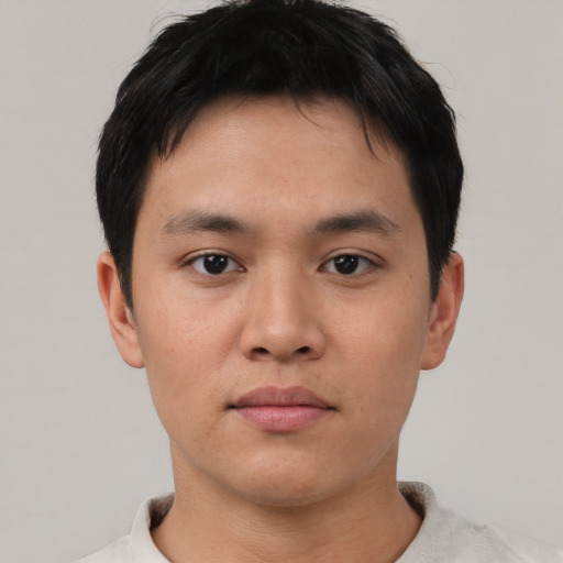 Neutral asian young-adult male with short  brown hair and brown eyes