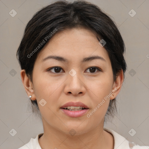 Joyful asian young-adult female with medium  brown hair and brown eyes