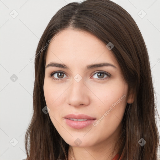 Neutral white young-adult female with long  brown hair and brown eyes