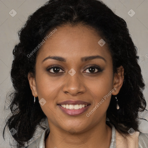 Joyful black young-adult female with long  brown hair and brown eyes