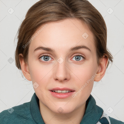 Joyful white young-adult female with medium  brown hair and blue eyes