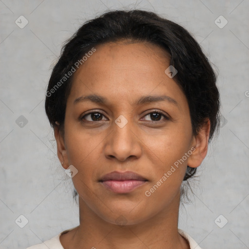 Joyful latino young-adult female with medium  black hair and brown eyes