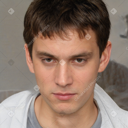 Neutral white young-adult male with short  brown hair and brown eyes
