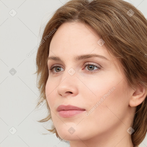 Neutral white young-adult female with medium  brown hair and grey eyes