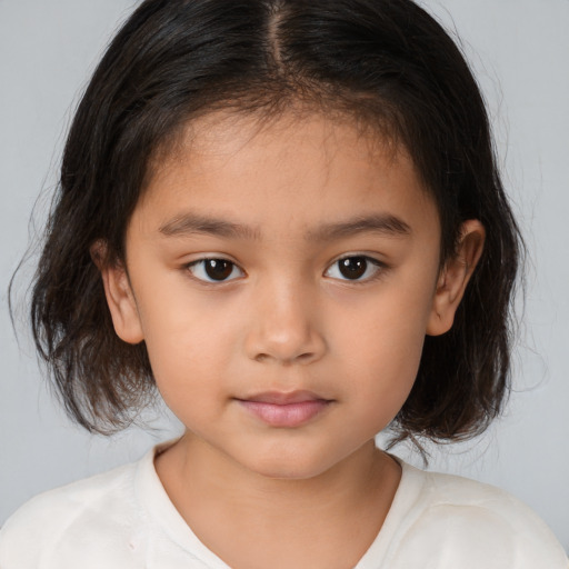 Neutral white child female with medium  brown hair and brown eyes