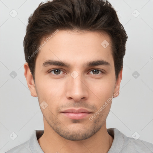 Neutral white young-adult male with short  brown hair and brown eyes