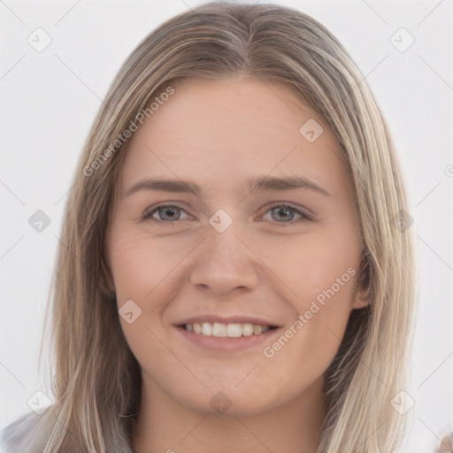 Joyful white young-adult female with long  brown hair and grey eyes