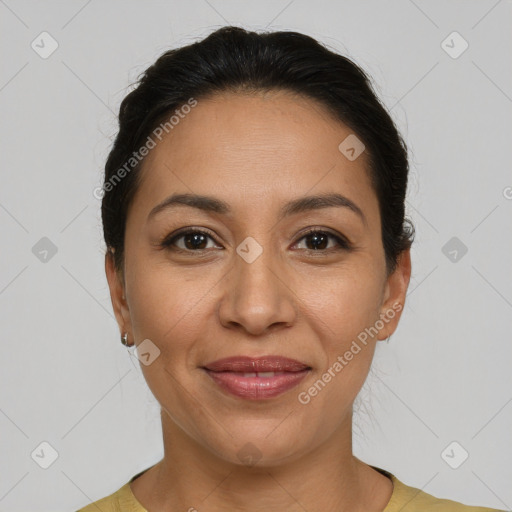 Joyful latino young-adult female with short  brown hair and brown eyes