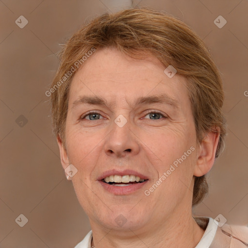 Joyful white adult female with short  brown hair and brown eyes