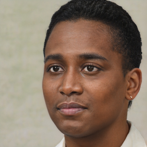 Neutral black young-adult male with short  black hair and brown eyes