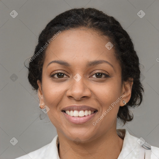 Joyful black young-adult female with medium  brown hair and brown eyes