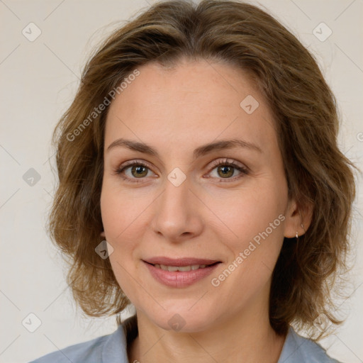 Joyful white young-adult female with medium  brown hair and green eyes