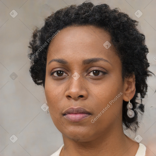 Neutral black young-adult female with short  black hair and brown eyes