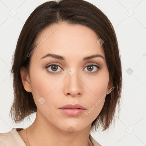 Neutral white young-adult female with medium  brown hair and brown eyes