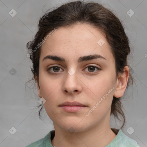 Neutral white young-adult female with medium  brown hair and brown eyes