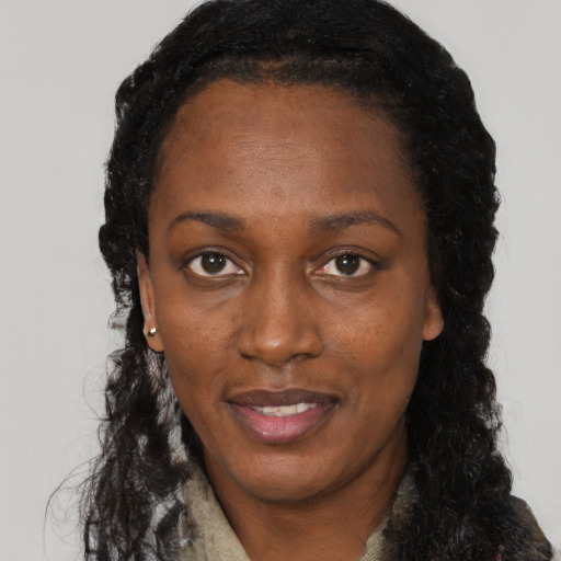Neutral black young-adult female with long  black hair and brown eyes
