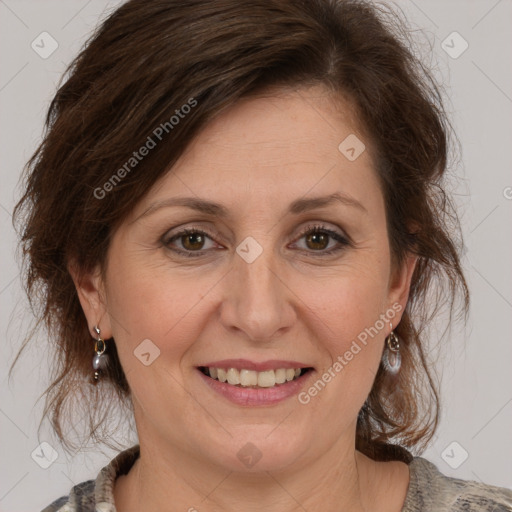 Joyful white adult female with medium  brown hair and brown eyes