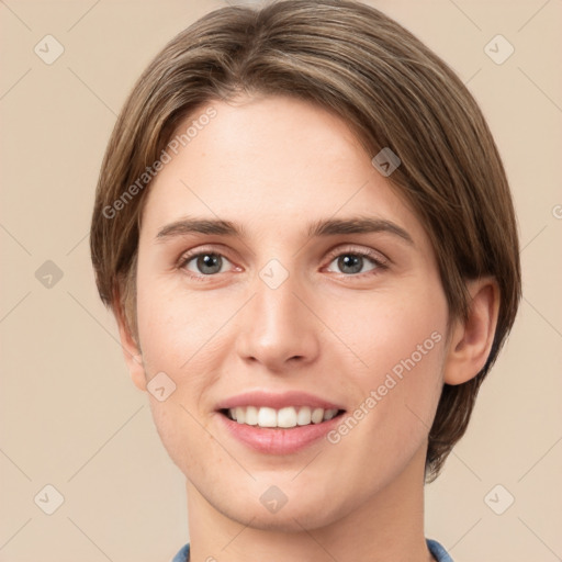 Joyful white young-adult female with short  brown hair and grey eyes