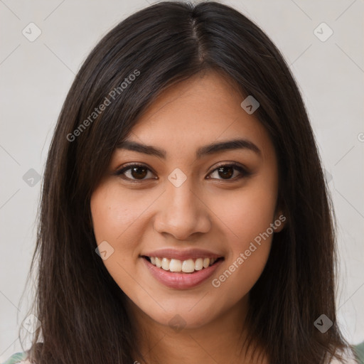 Joyful latino young-adult female with long  brown hair and brown eyes