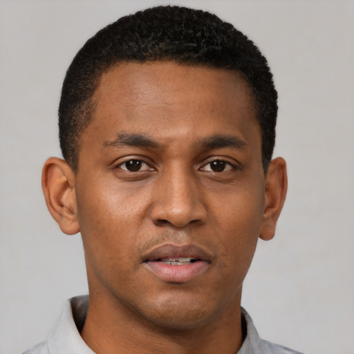 Neutral black young-adult male with short  black hair and brown eyes