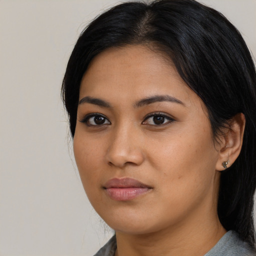 Neutral asian young-adult female with long  black hair and brown eyes