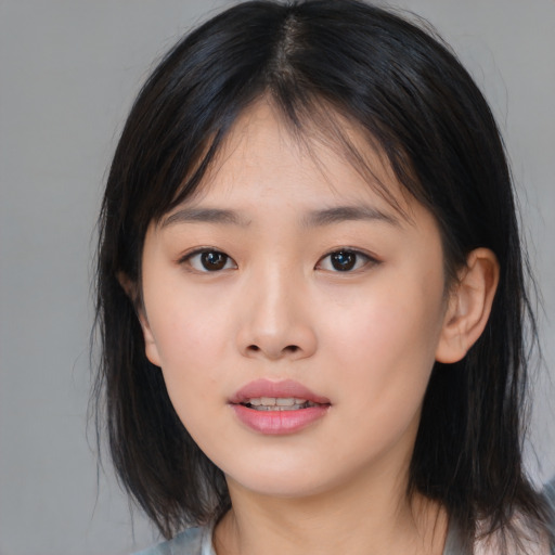 Neutral asian young-adult female with medium  brown hair and brown eyes