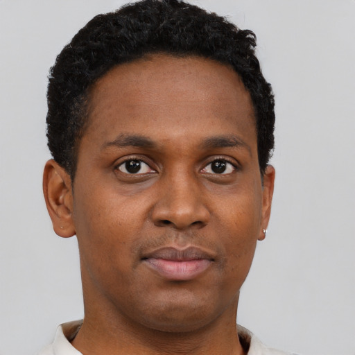 Neutral black young-adult male with short  brown hair and brown eyes