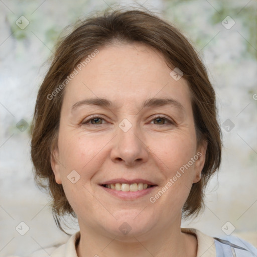 Joyful white adult female with medium  brown hair and grey eyes