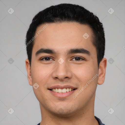 Joyful white young-adult male with short  black hair and brown eyes