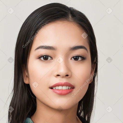 Joyful white young-adult female with long  black hair and brown eyes