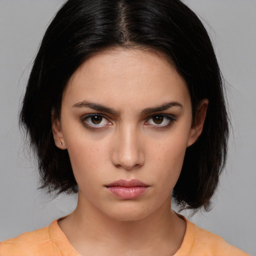 Neutral white young-adult female with medium  brown hair and brown eyes