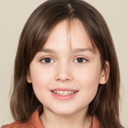 Joyful white child female with medium  brown hair and brown eyes