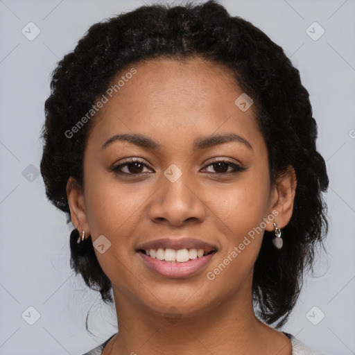 Joyful latino young-adult female with short  black hair and brown eyes