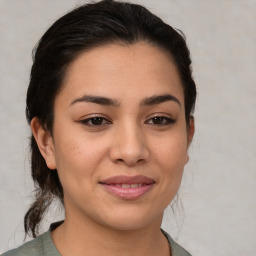 Joyful asian young-adult female with medium  brown hair and brown eyes