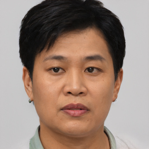 Neutral asian adult male with short  black hair and brown eyes