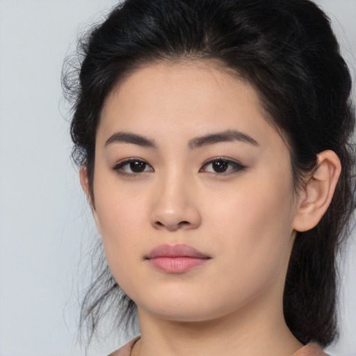Neutral asian young-adult female with medium  brown hair and brown eyes