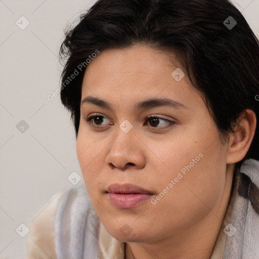 Joyful asian young-adult female with long  brown hair and brown eyes