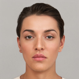 Neutral white young-adult female with short  brown hair and brown eyes